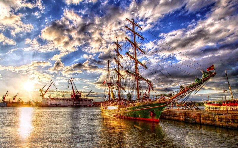 Sailing Ship in Harbor — Blue, Dramatic, Sunset, Photograph, Cranes