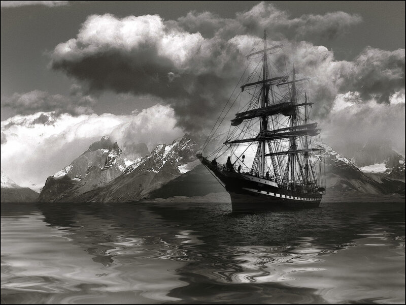 Sailing ship in mountainous waters