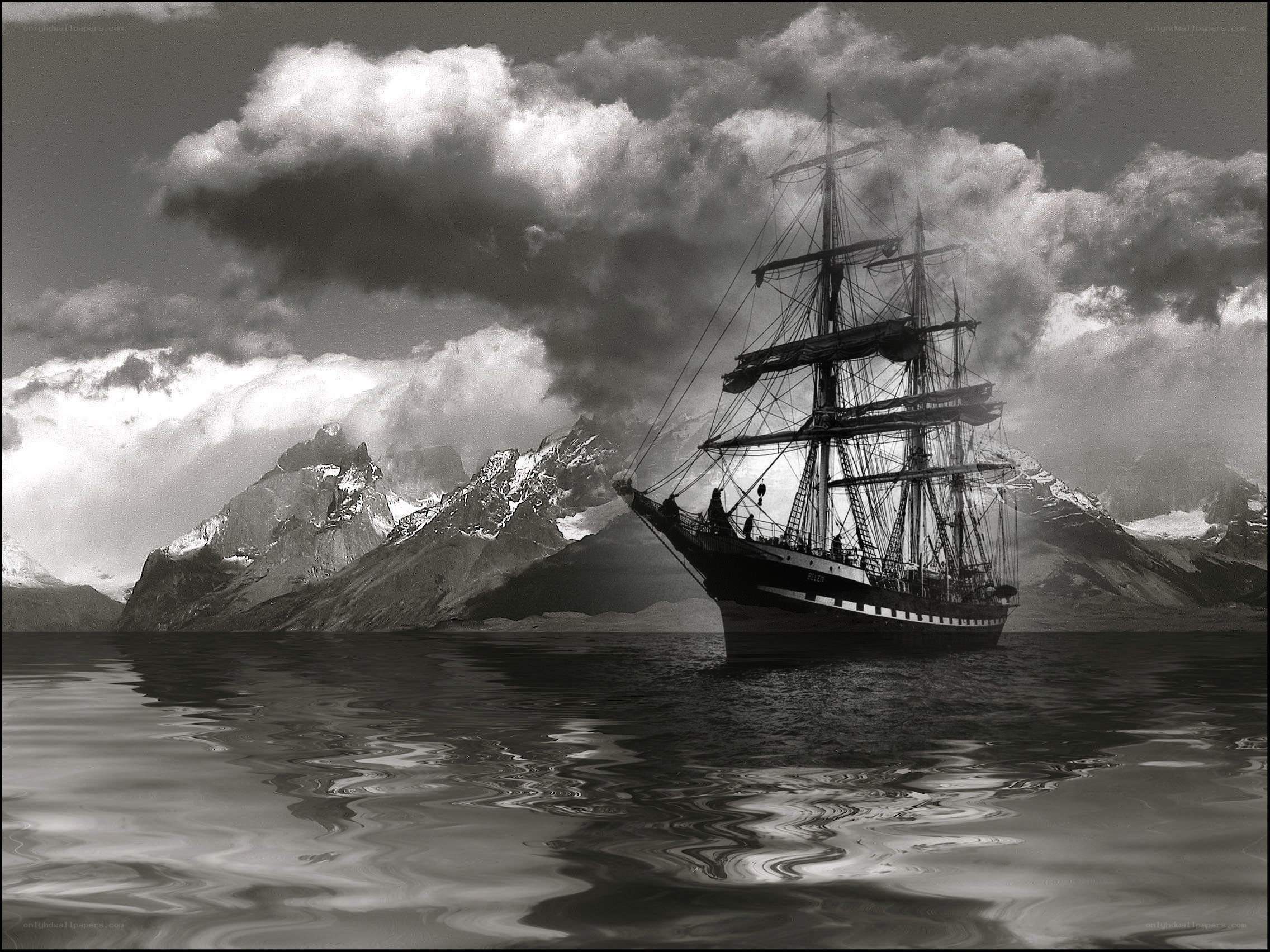 Sailing ship in mountainous waters