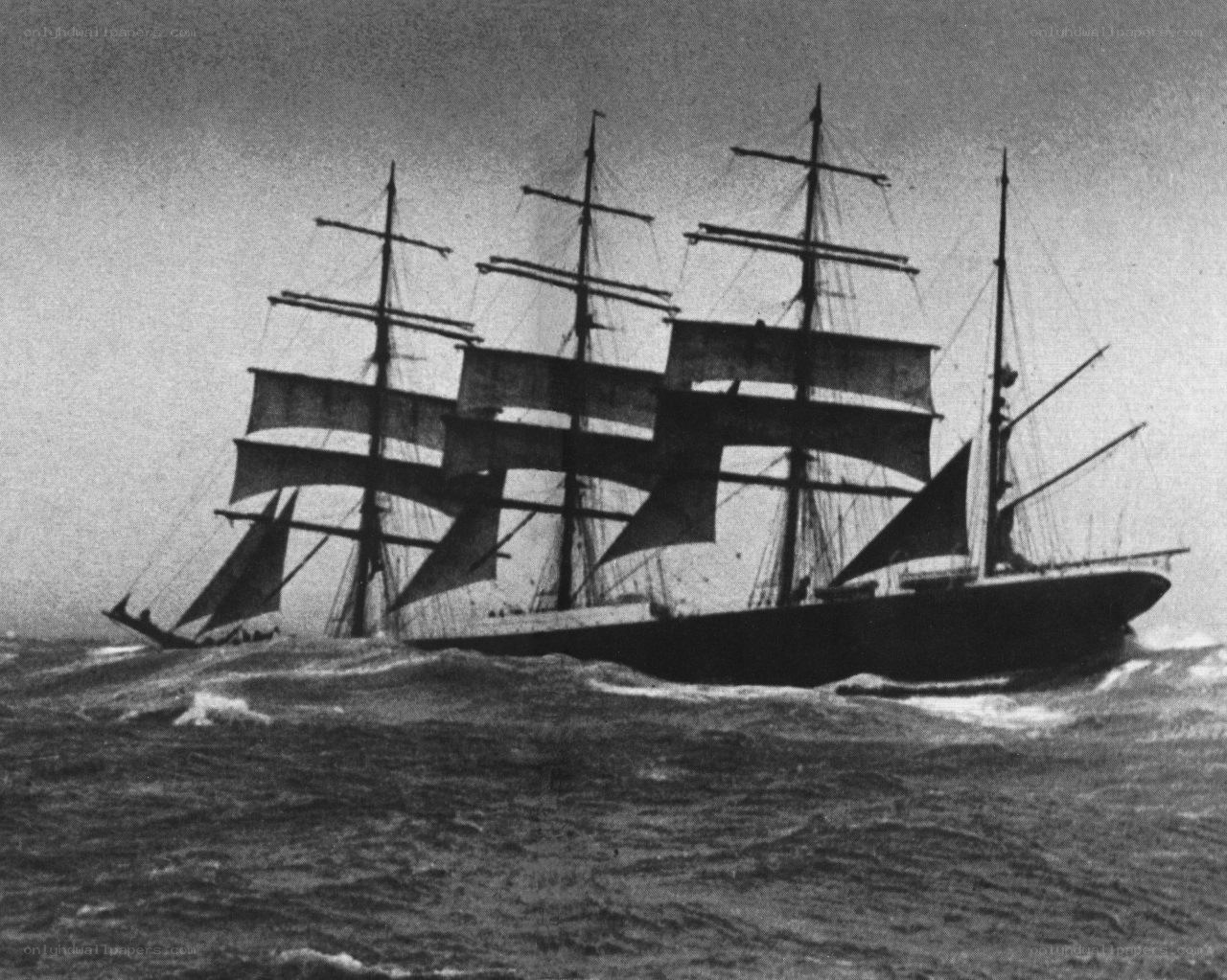 Sailing ship in rough seas
