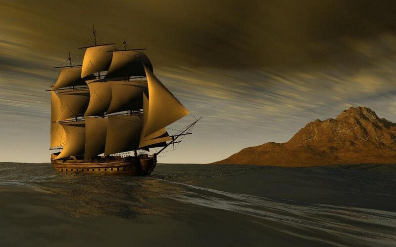 sailing ship near mountain