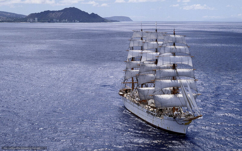 Sailing ship near volcanic island