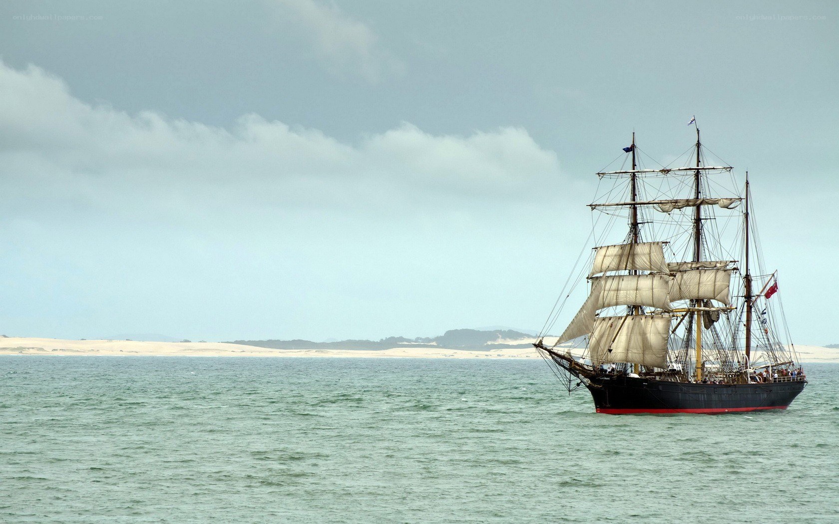 sailing ship on calm sea