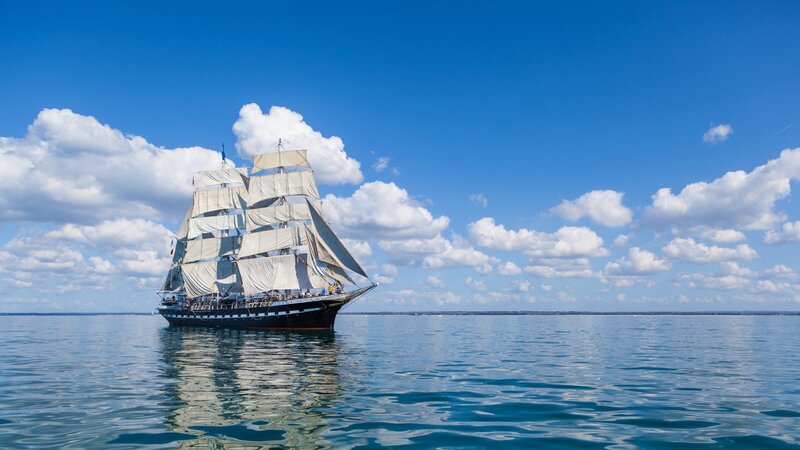 Sailing Ship on Calm Water — Blue