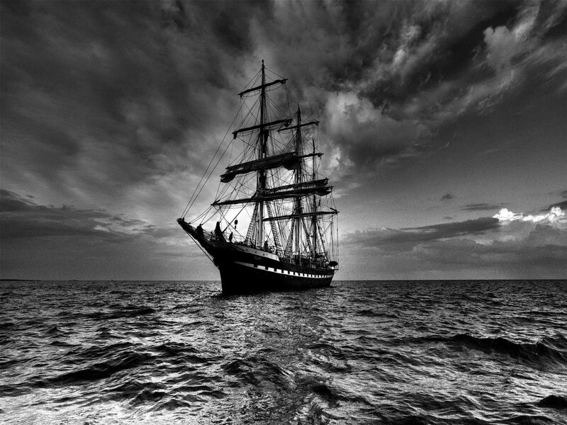Sailing Ship on Ocean — Black, Dramatic, Sunset