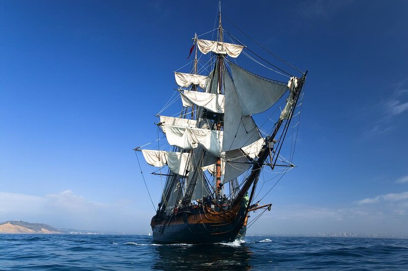 Sailing Ship on Ocean — Blue, Serene, Afternoon, Photograph, Sky, Land