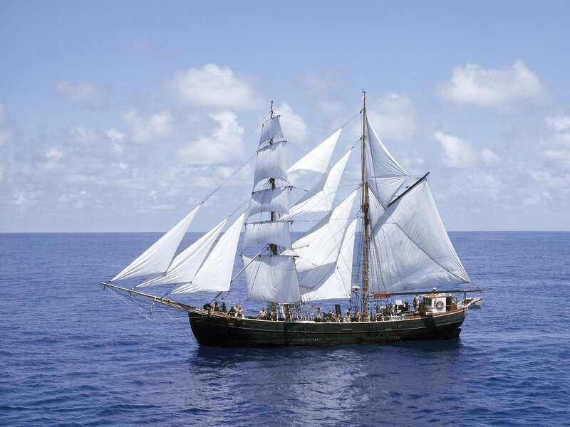 Sailing ship on open ocean