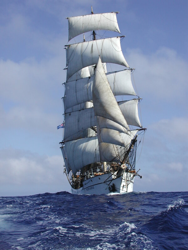 Sailing ship on open ocean