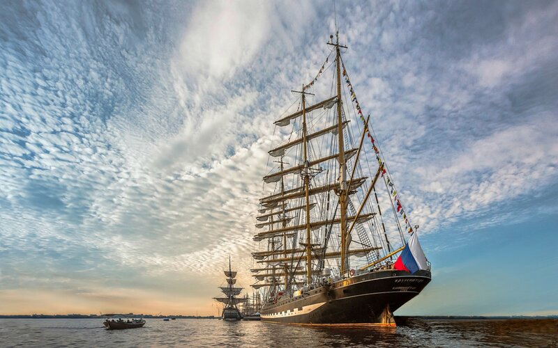 Sailing Ship on Water — Blue, Dramatic, Sunset