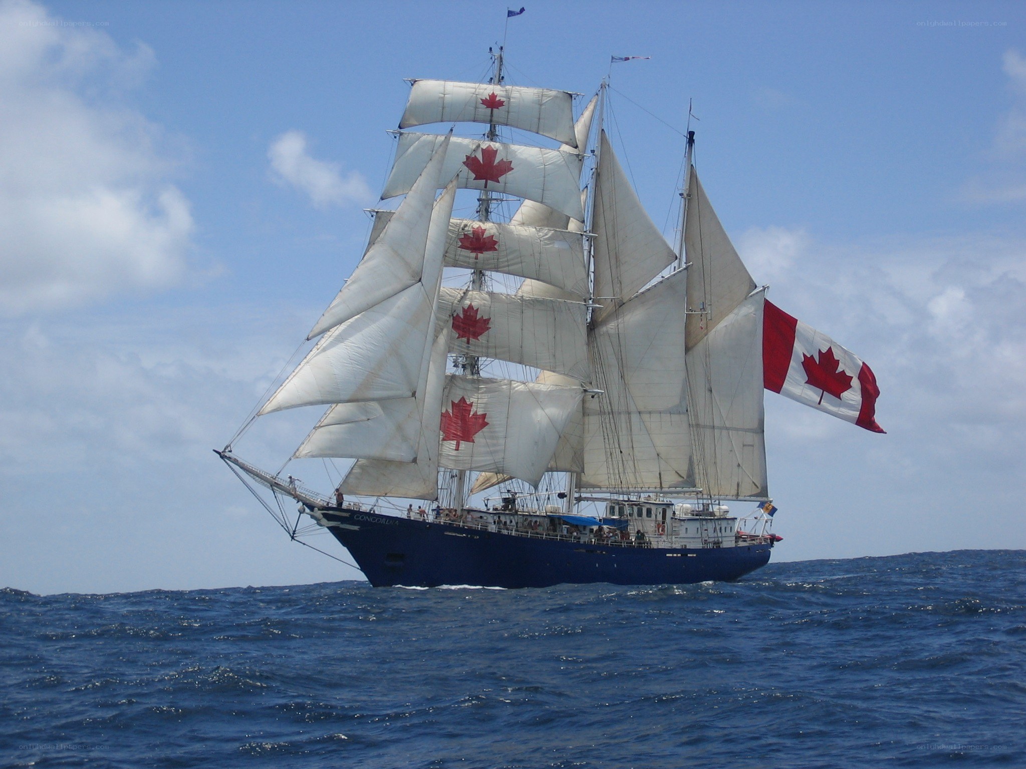 Sailing ship with Canadian flags