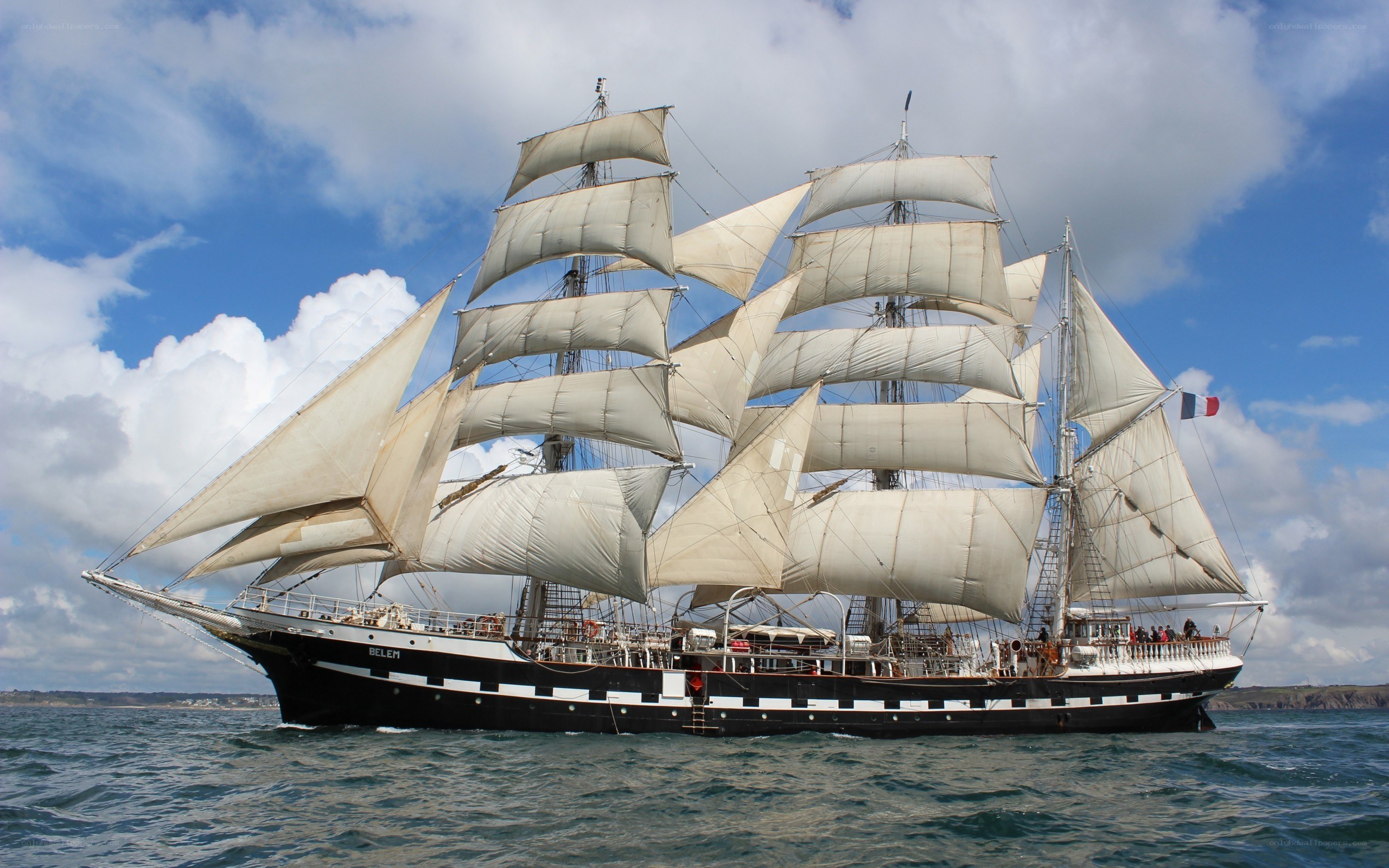 Sailing ship with full sails