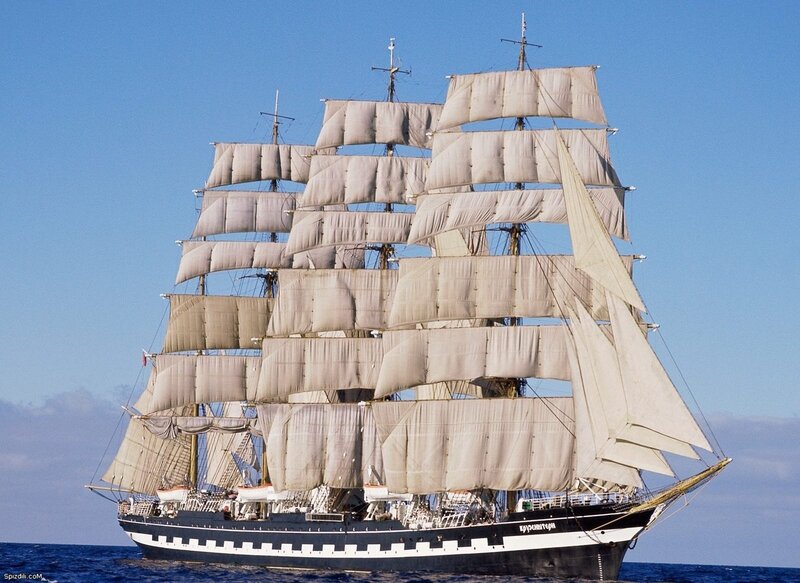 Sailing ship with full sails