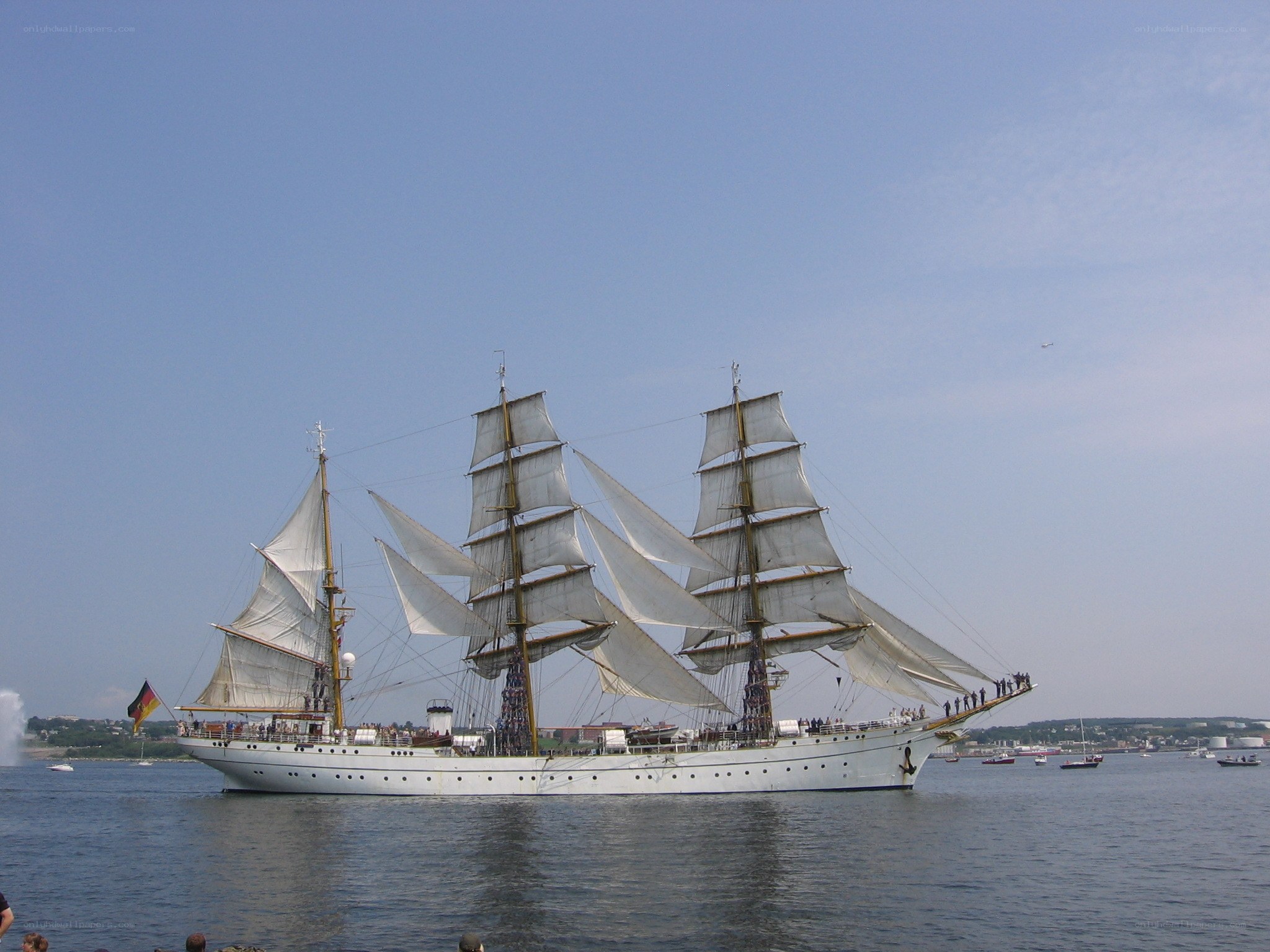 Sailing ship with full sails