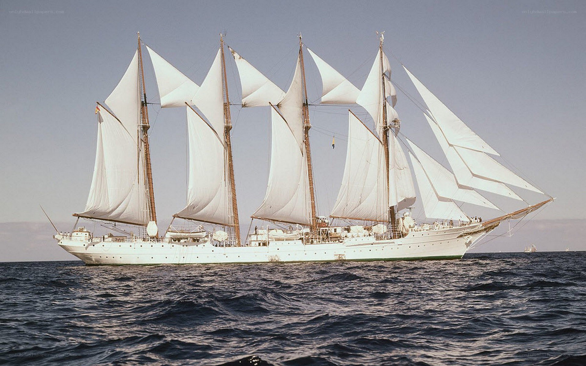sailing ship with white sails
