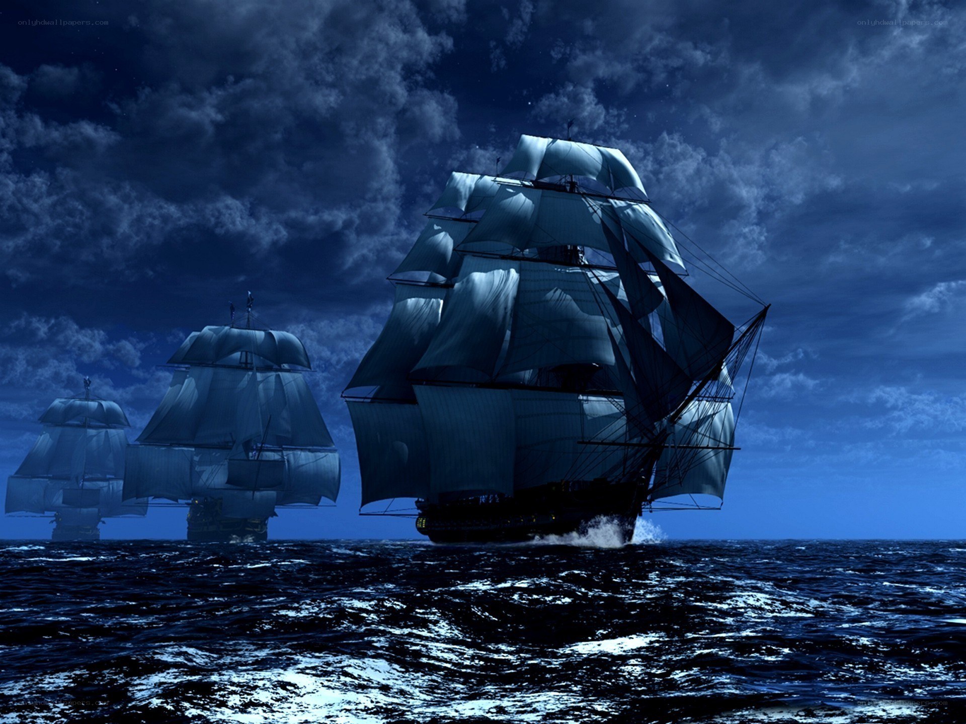sailing ships at night