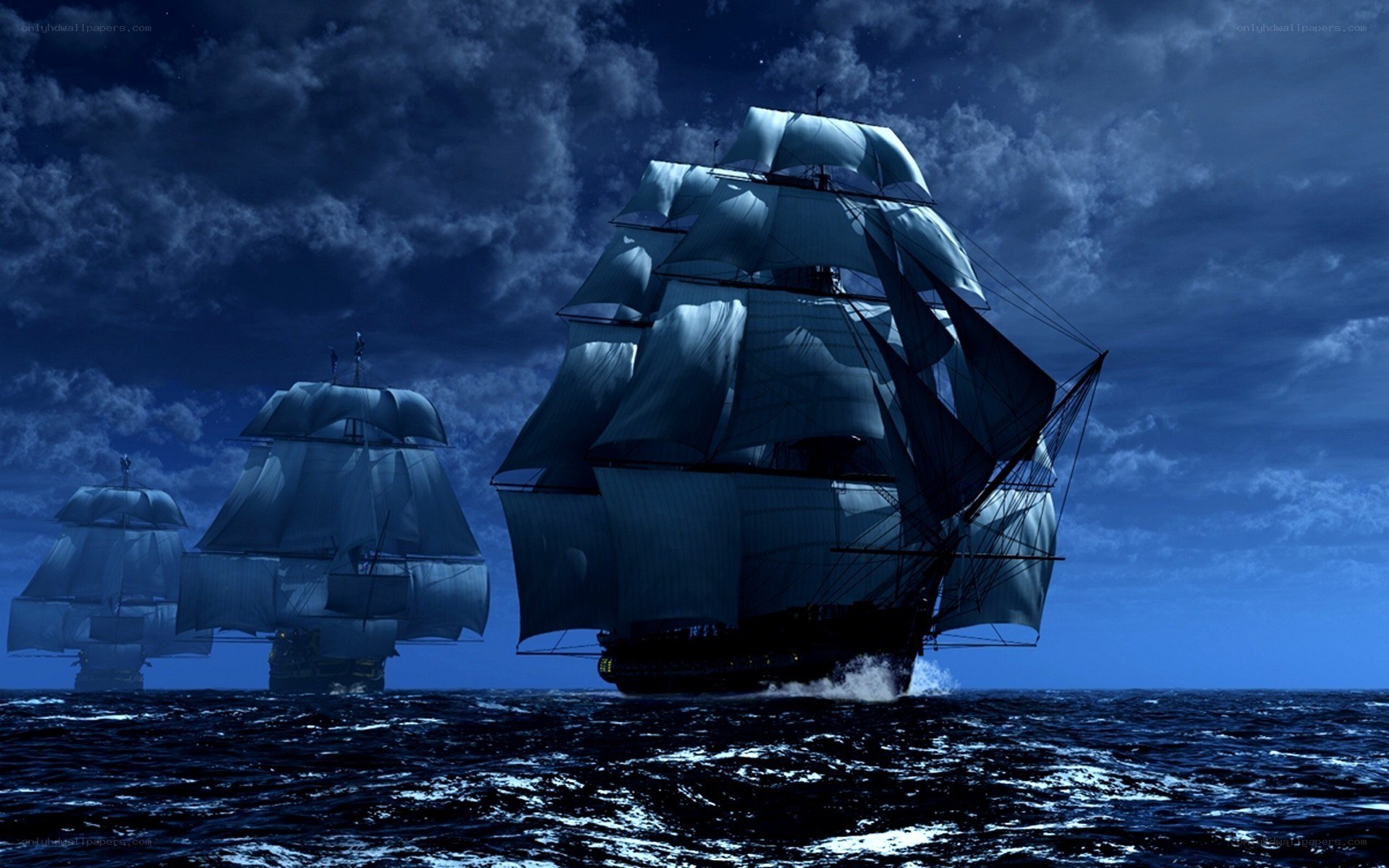 sailing ships at night