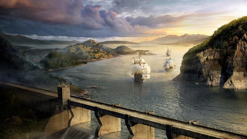 Sailing ships in a coastal inlet