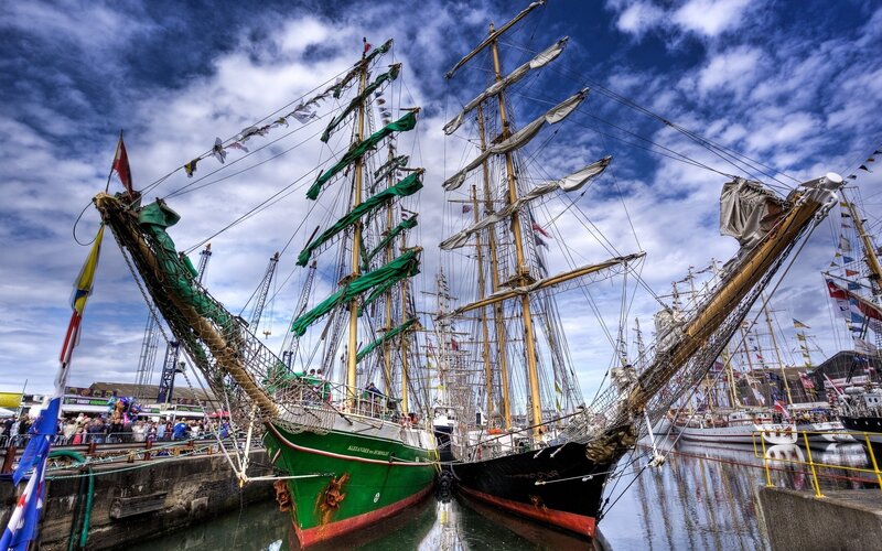 Sailing Ships in Harbor — Blue, Dramatic, Afternoon, Photograph, Crowd