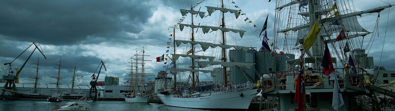 Sailing Ships in Harbor — Gray, Dramatic