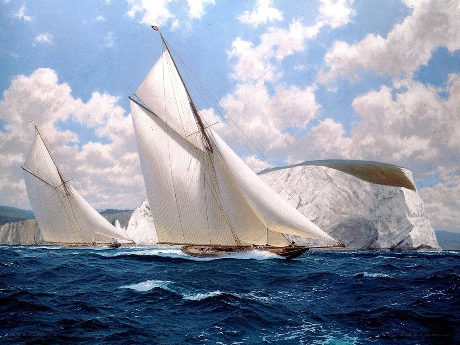 Sailing ships near white cliffs