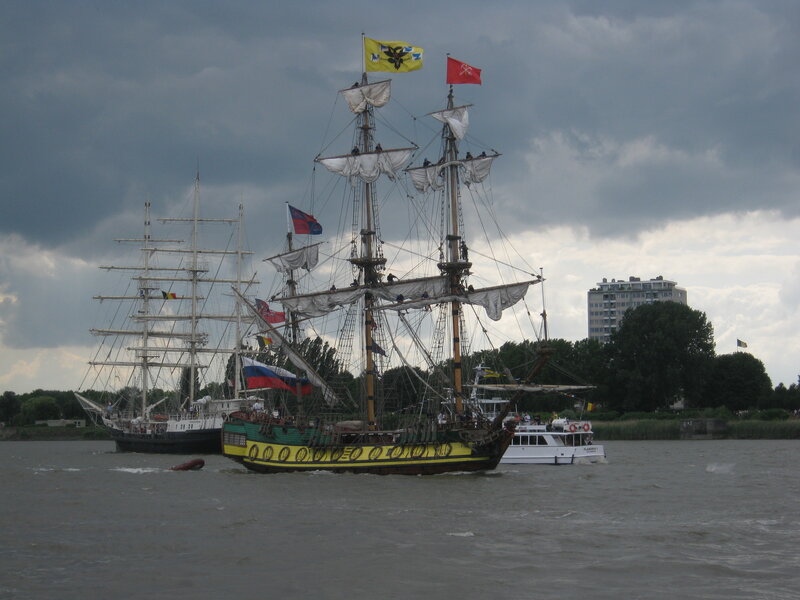 Sailing ships on a river