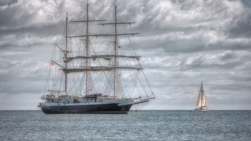 Sailing ships on the open sea