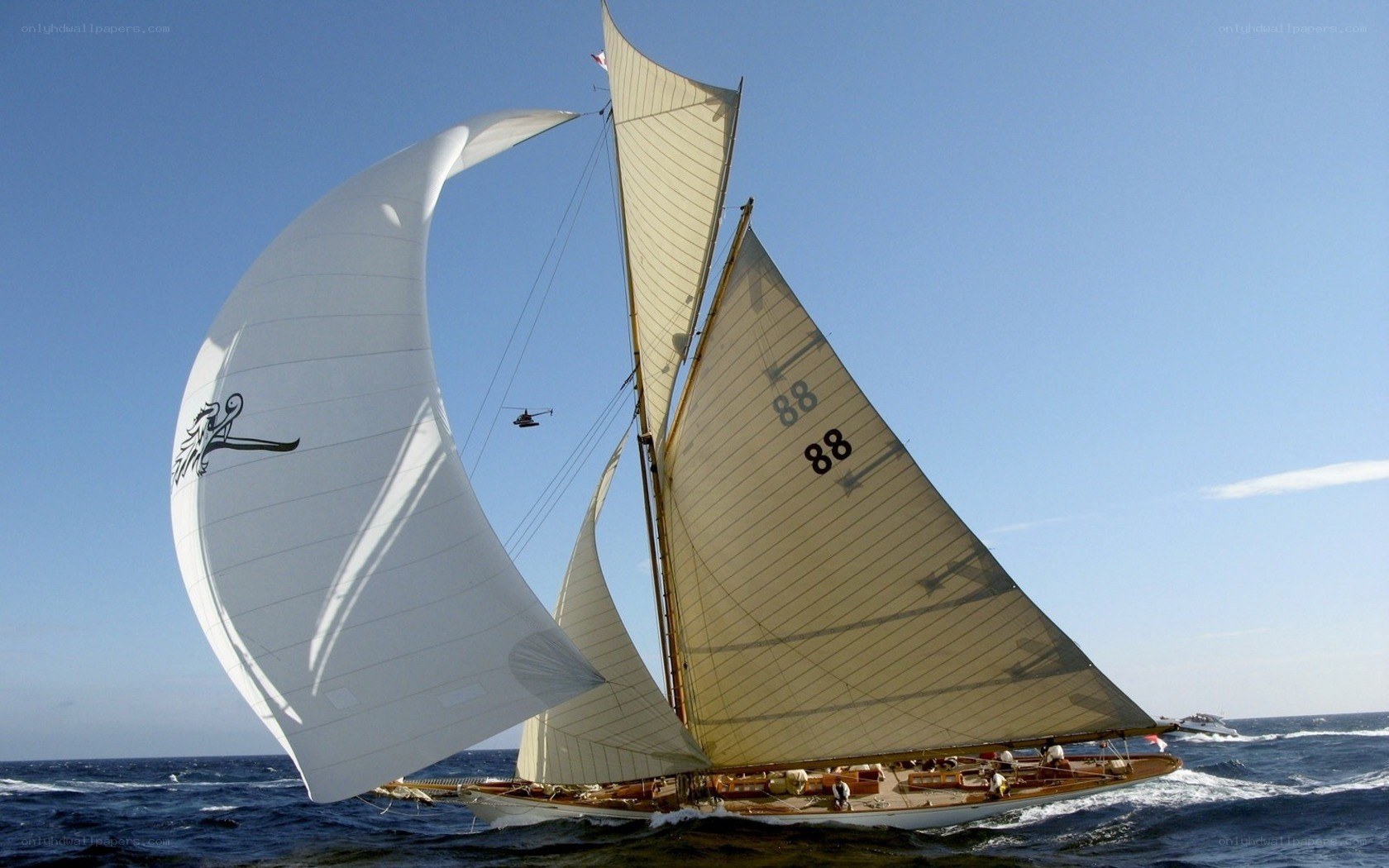 Sailing yacht with sails up