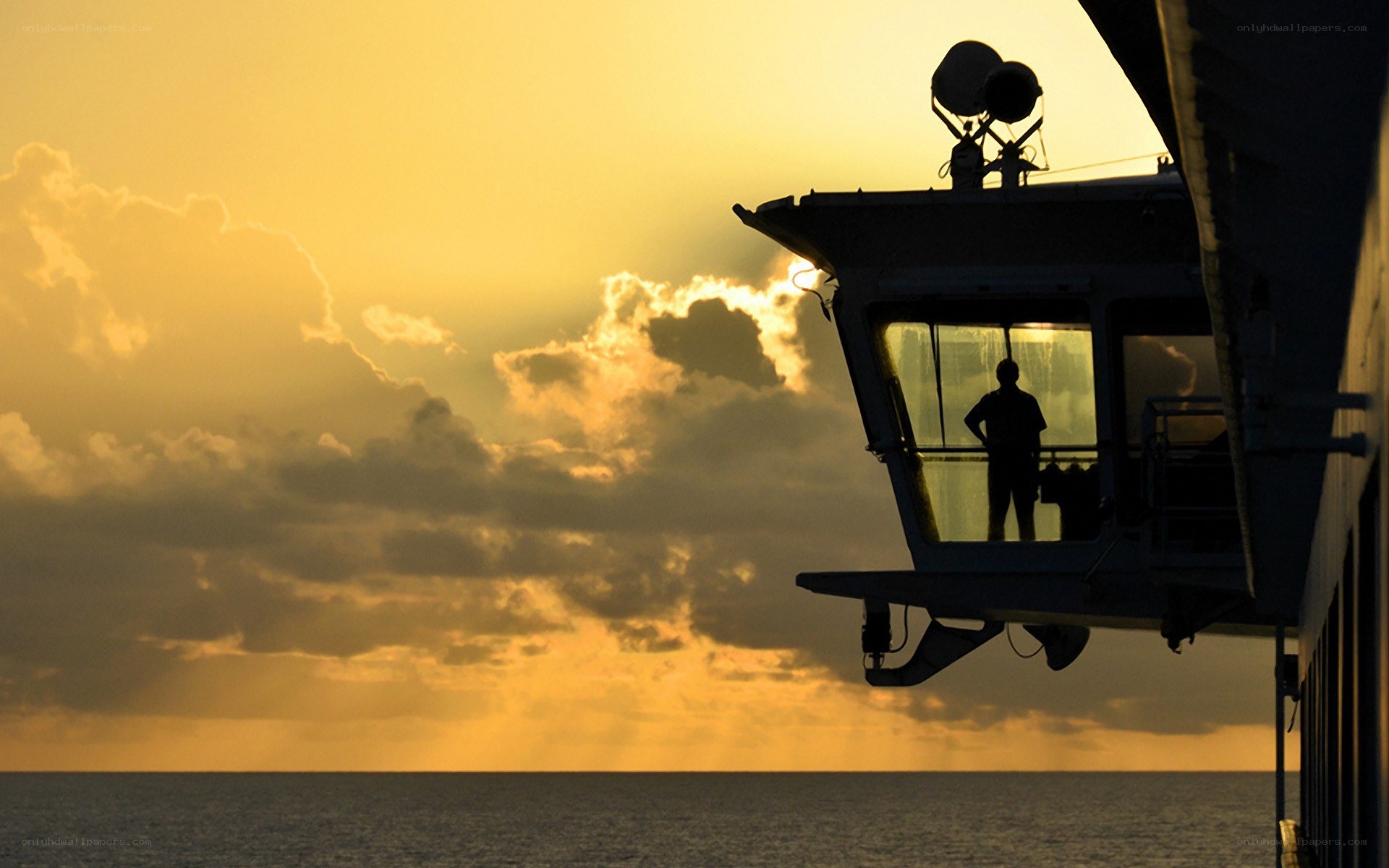 sailor at sunset on ship