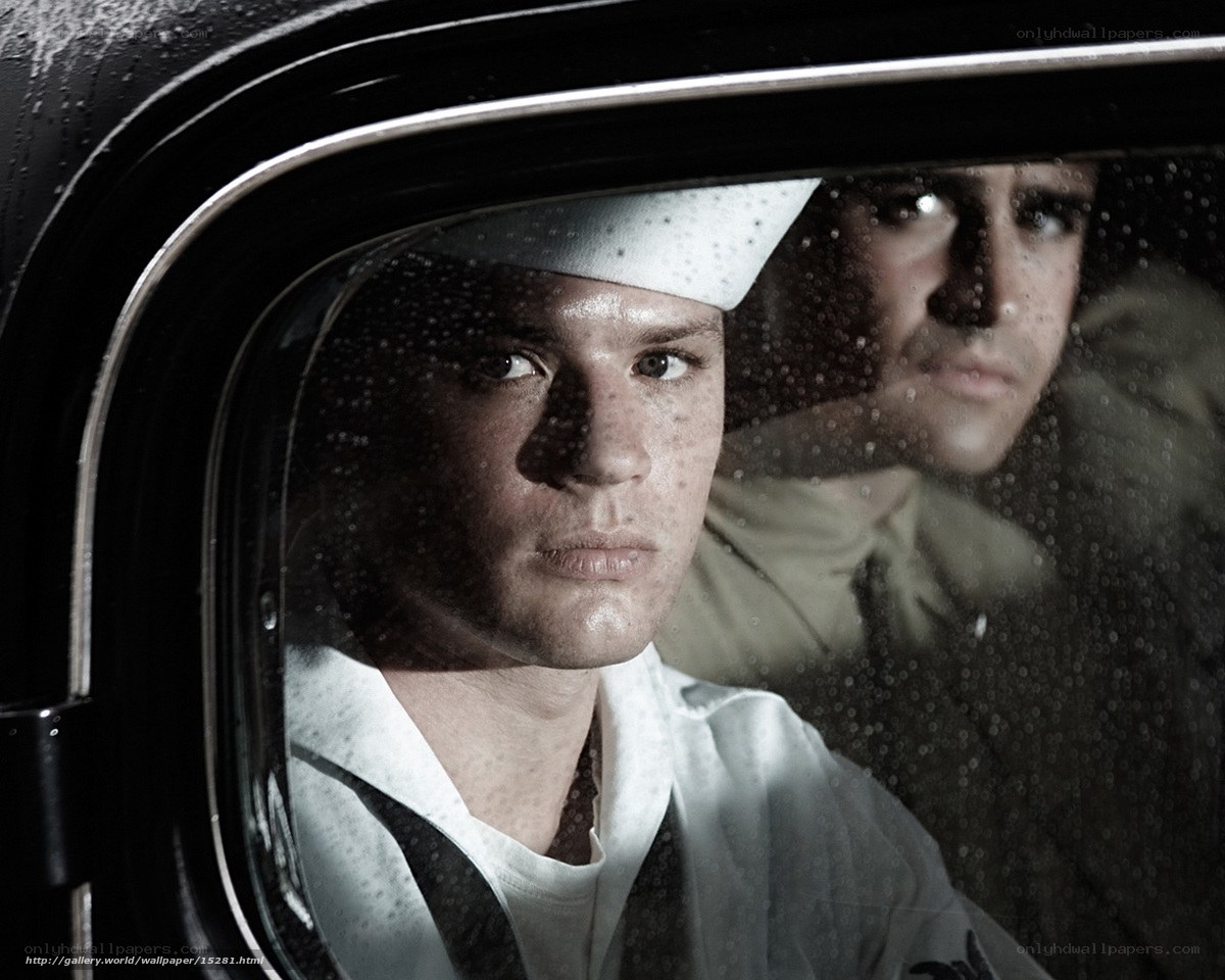 sailor in car window
