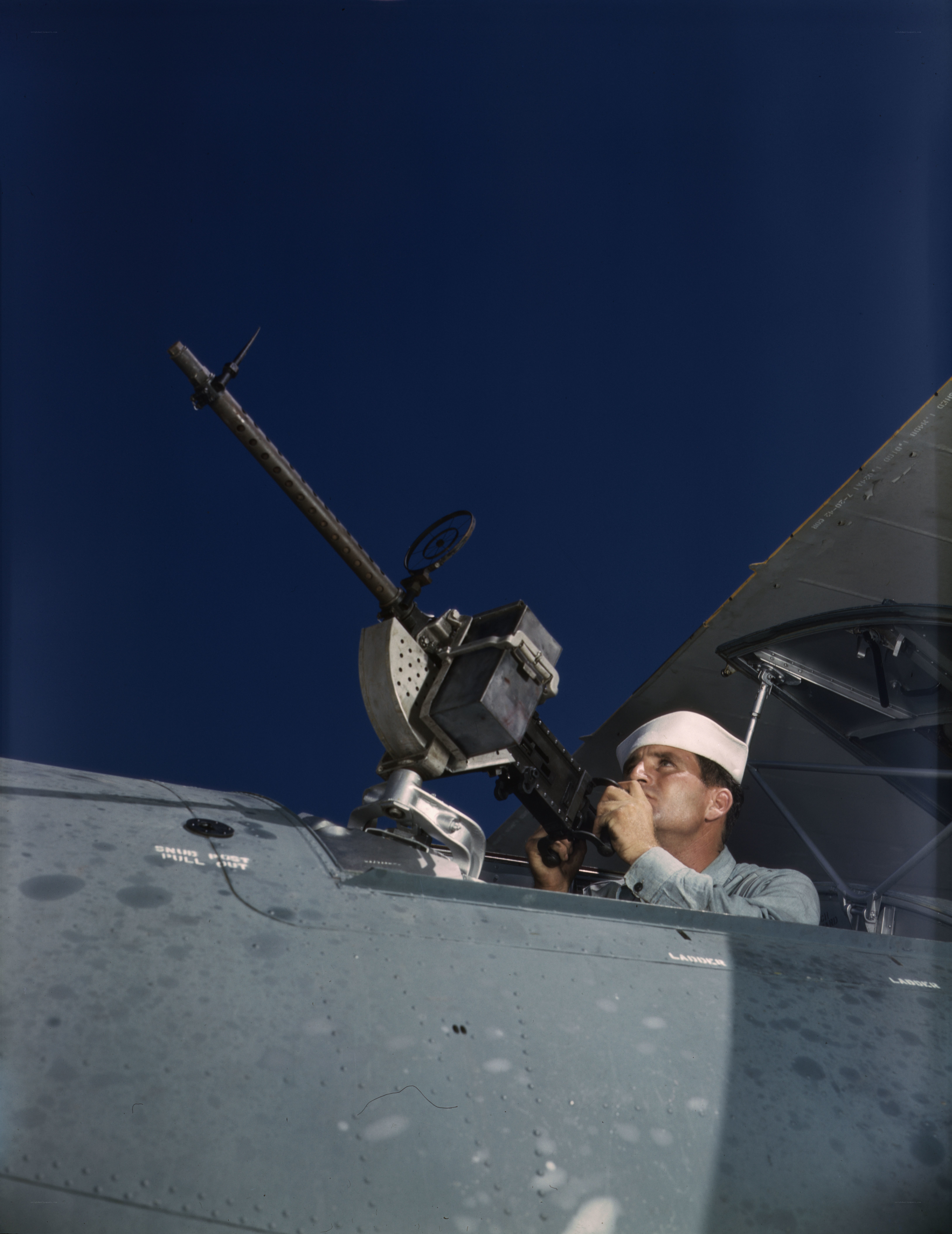 Sailor manning aircraft gun