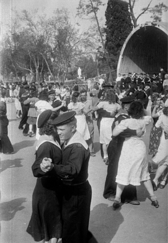 Sailors dancing at a park