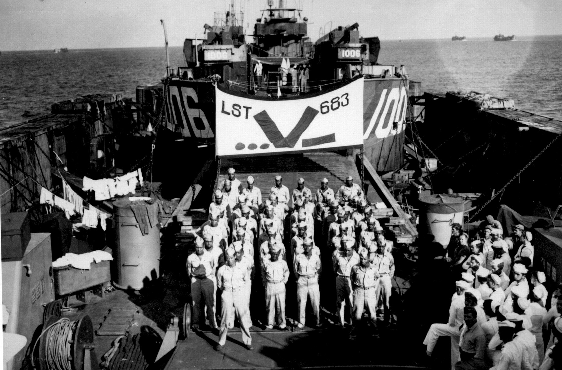 Sailors on a naval vessel