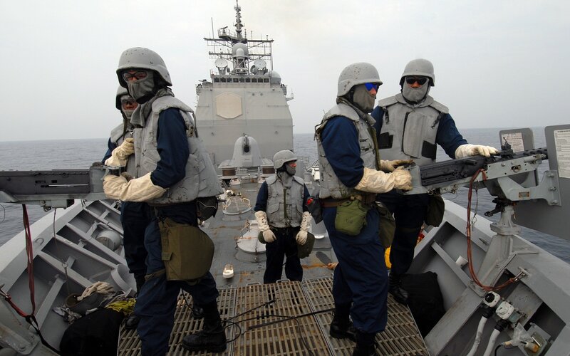 Sailors on a warship deck