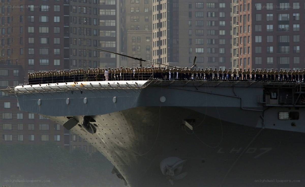 Sailors on aircraft carrier deck