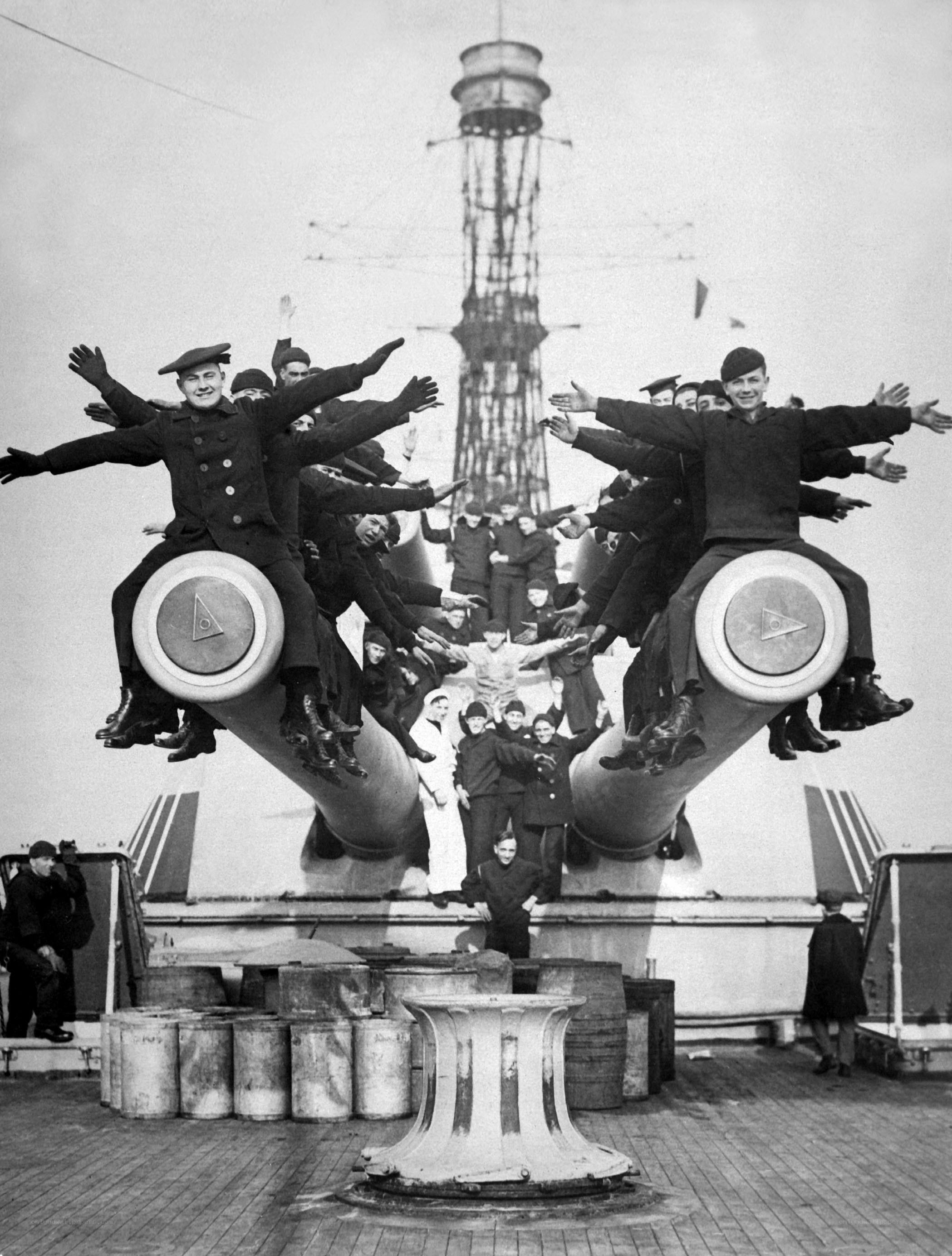 Sailors on ship cannons
