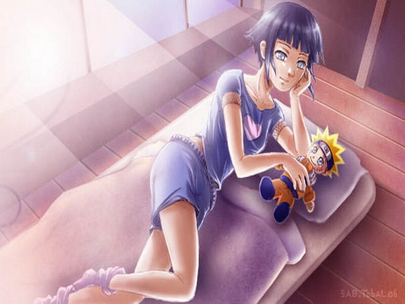 Sakura with Naruto doll