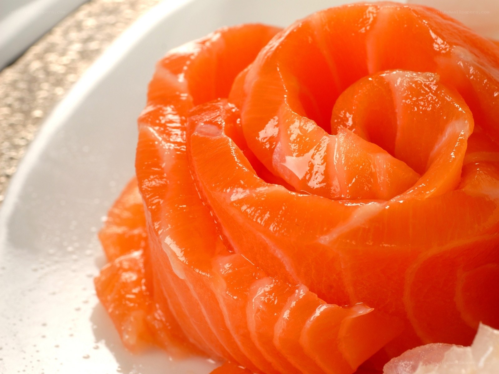 Salmon rose on white plate