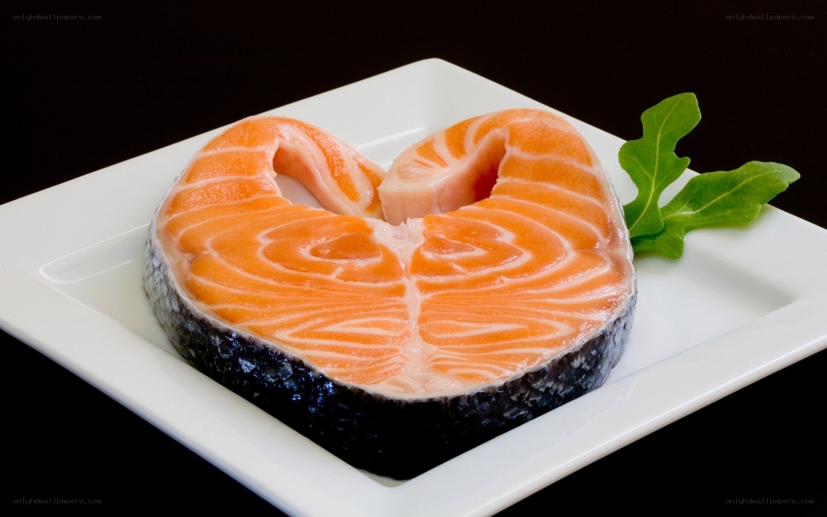 Salmon steak on white plate