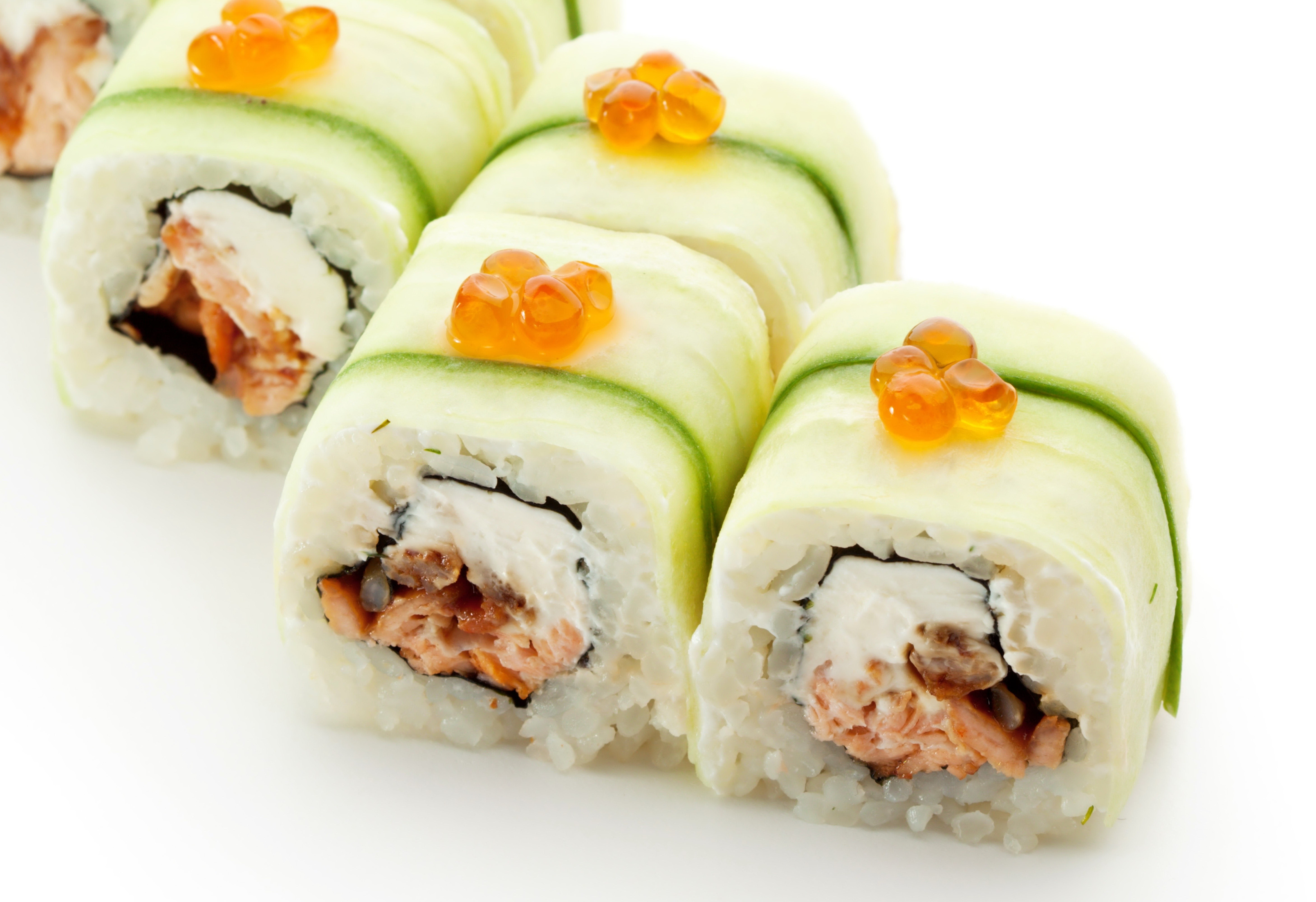 Salmon sushi rolls with caviar