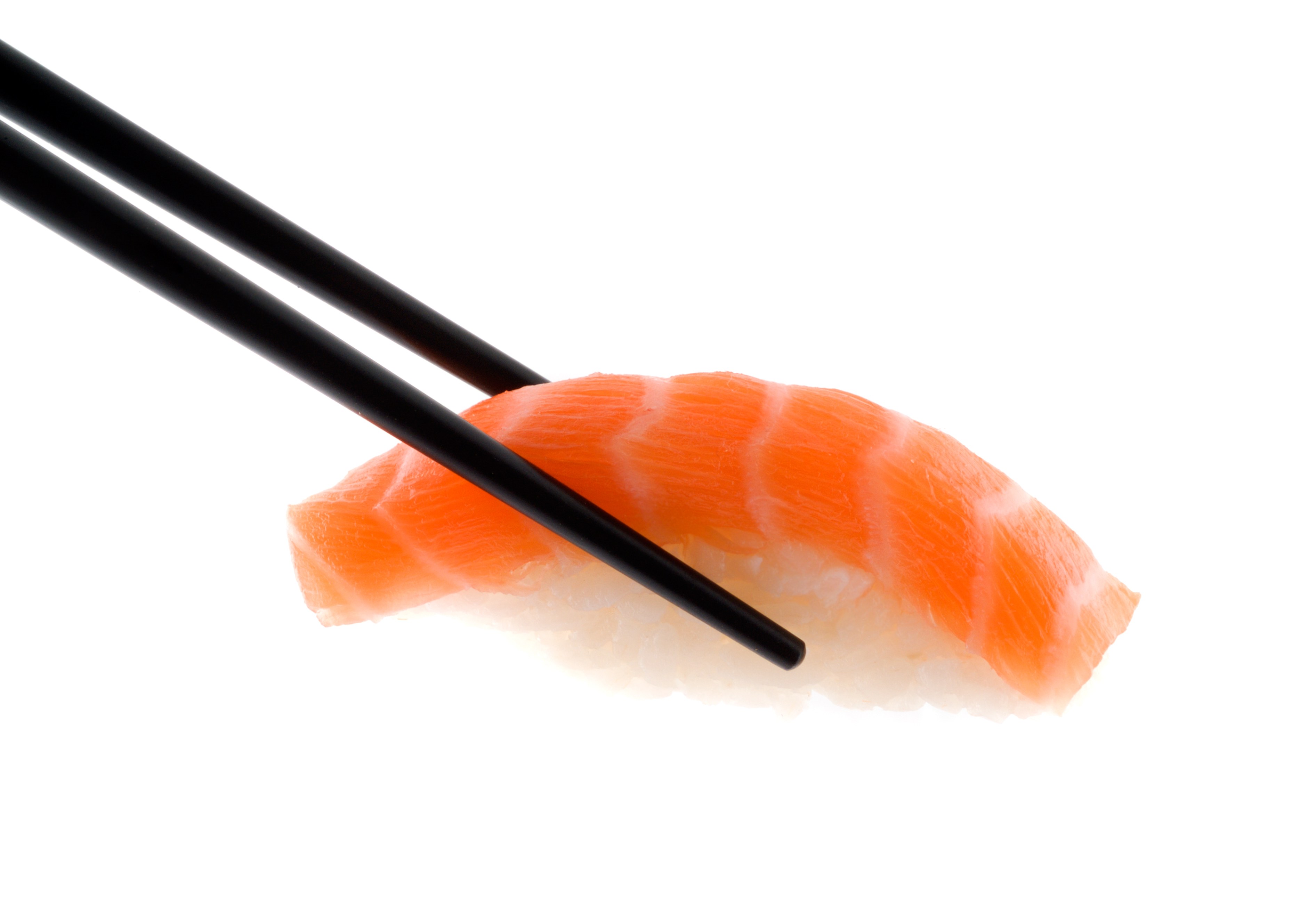 Salmon sushi with chopsticks