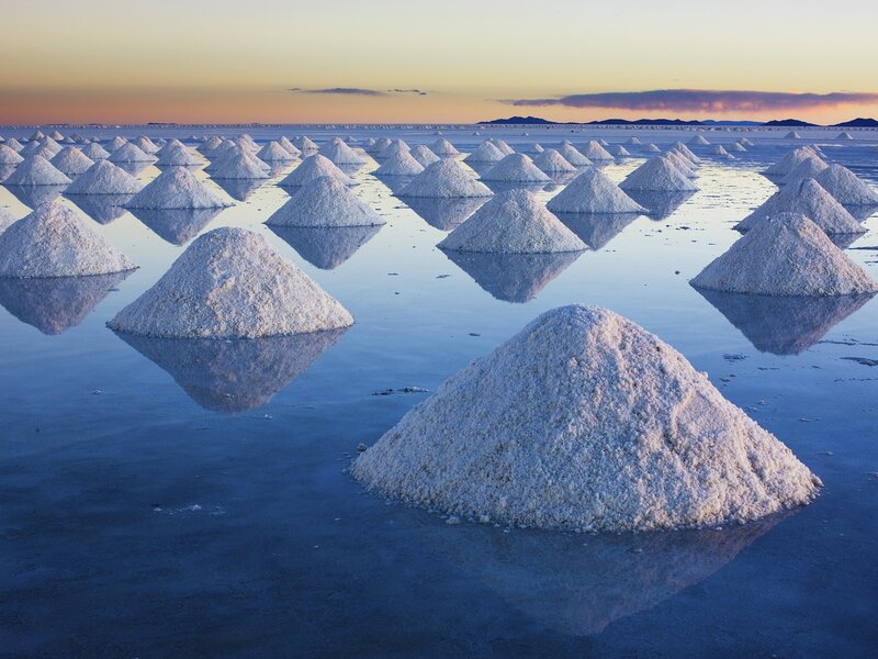 Salt piles at sunset