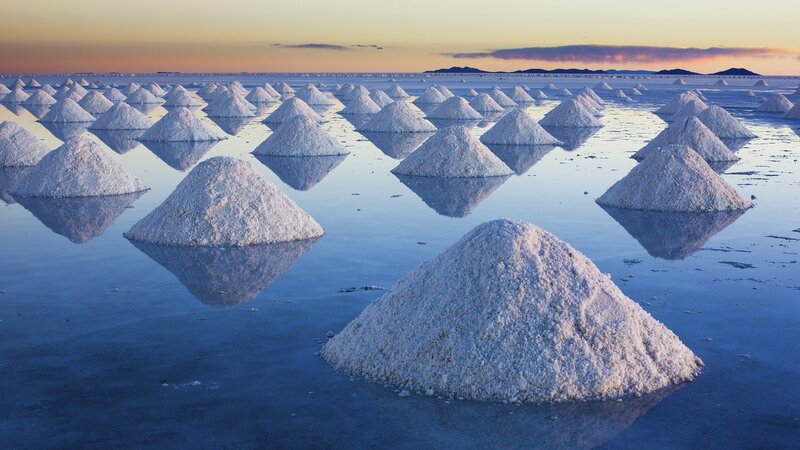 Salt piles at sunset