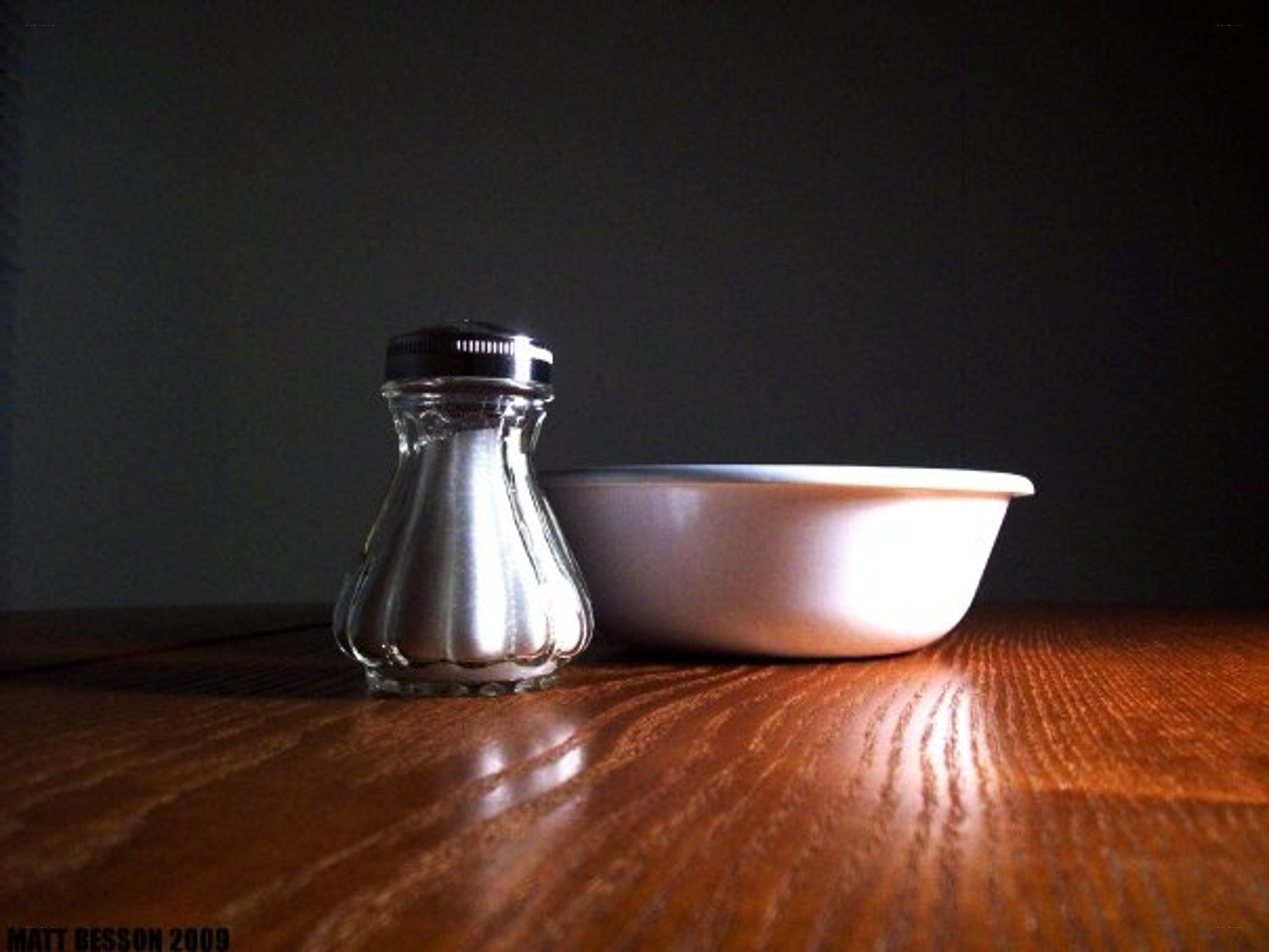 salt shaker and bowl on table