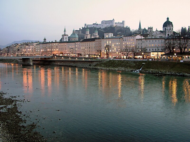 Salzburg at dusk with river and castle