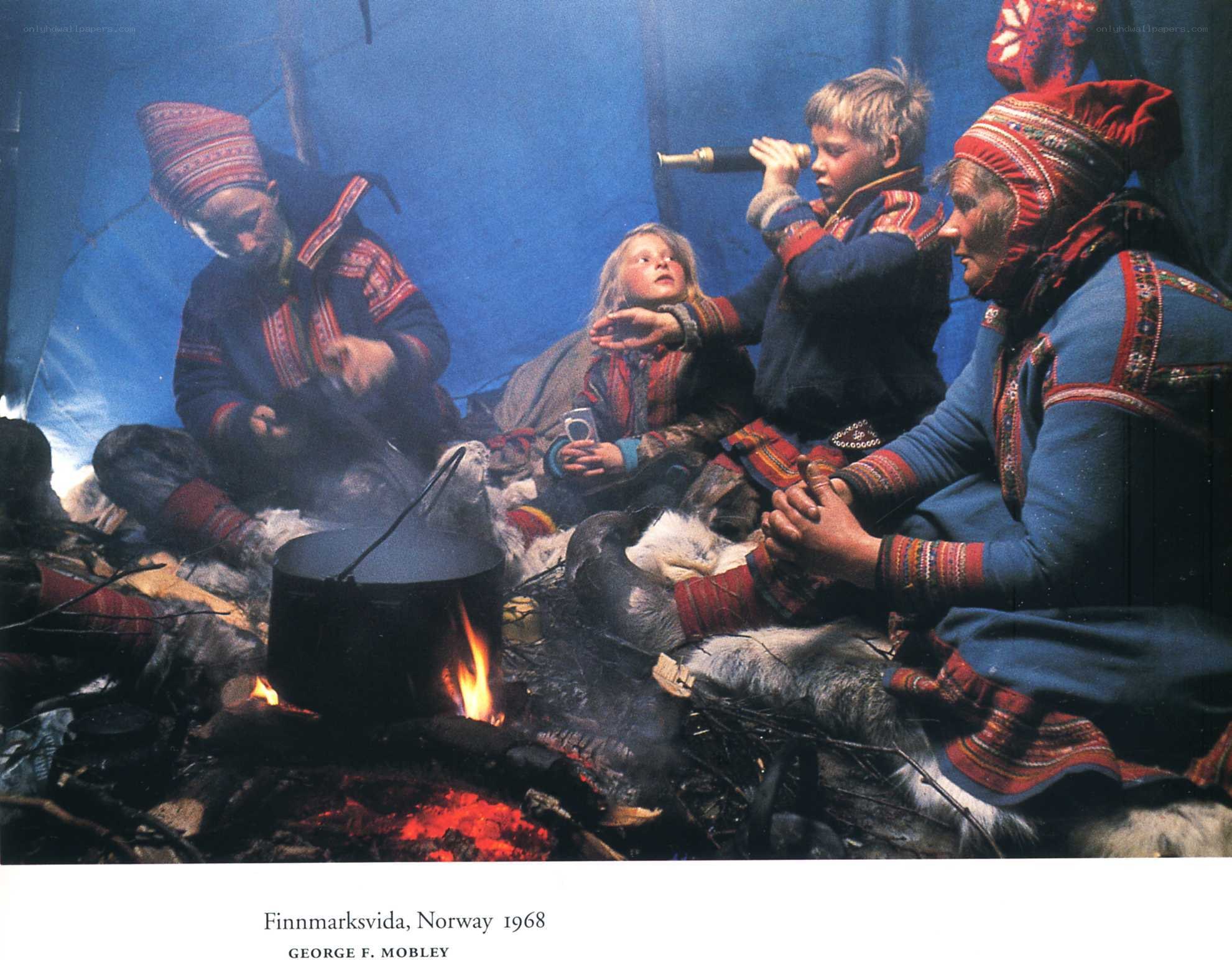 Sami family by fire