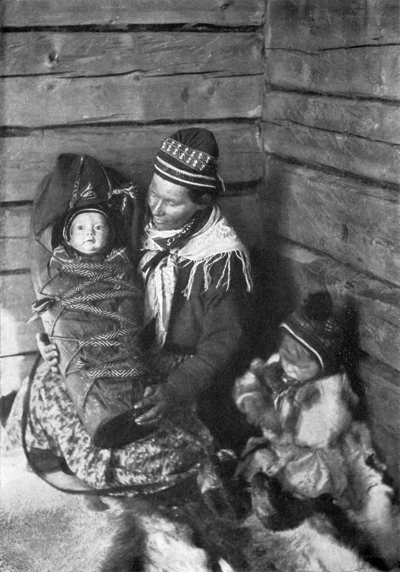 Sami woman with children