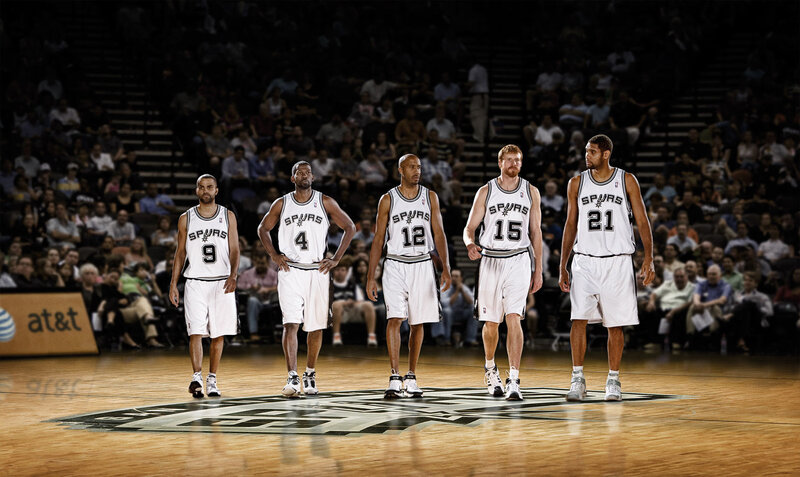 San Antonio Spurs players on court
