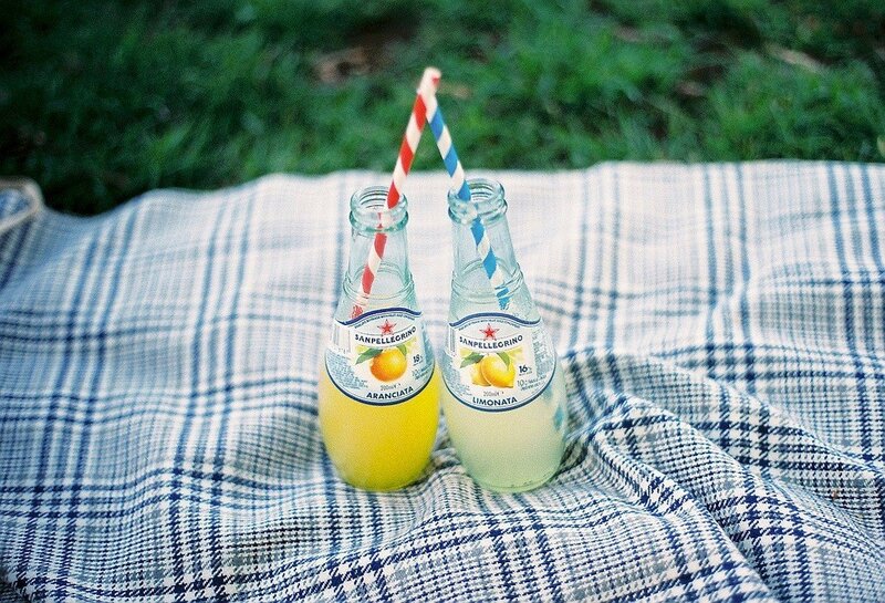 San Pellegrino bottles on a blanket