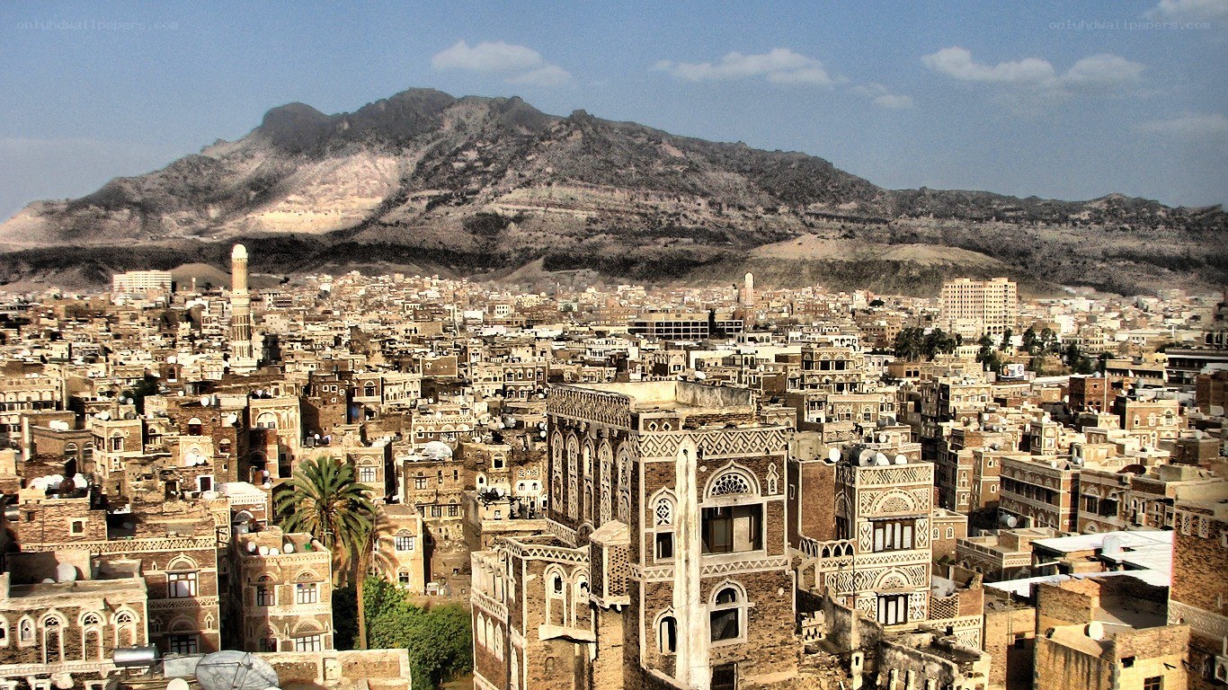 Sana'a cityscape with mountains