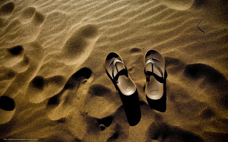 Sand and flip-flops on beach